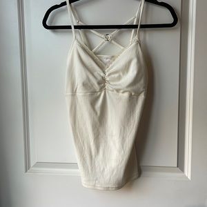 Strappy tank top, removable bra pads. No Boundaries.